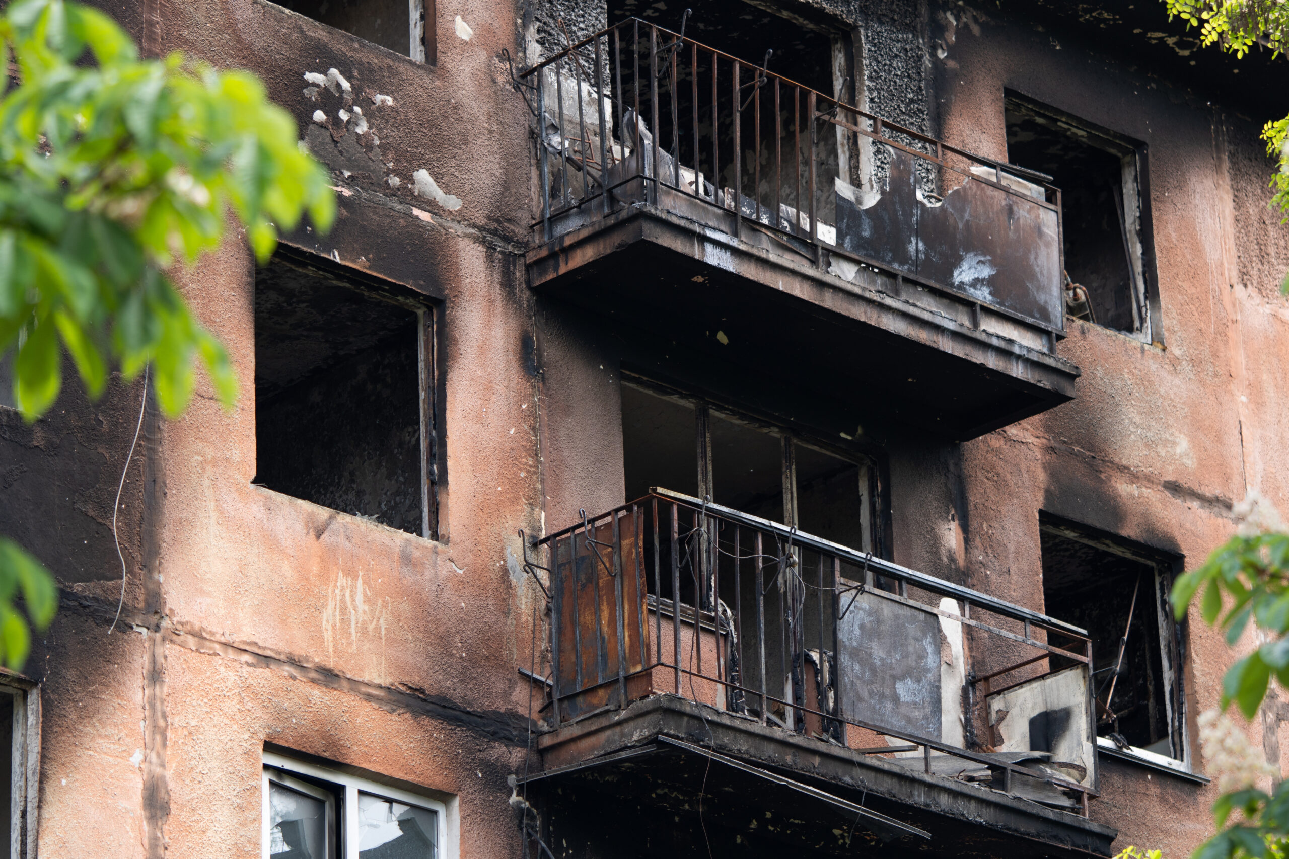 Restoration services are needed for a fire-damaged apartment building.