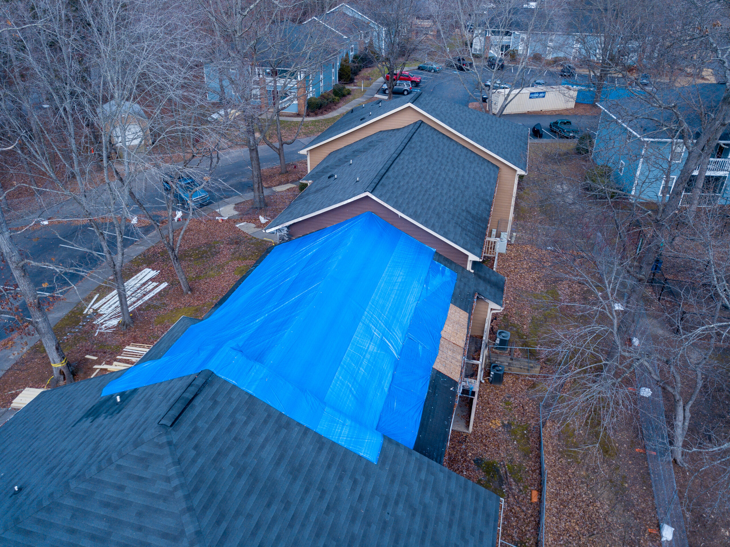 An overhead shot of an apartment building undergoing restoration services.